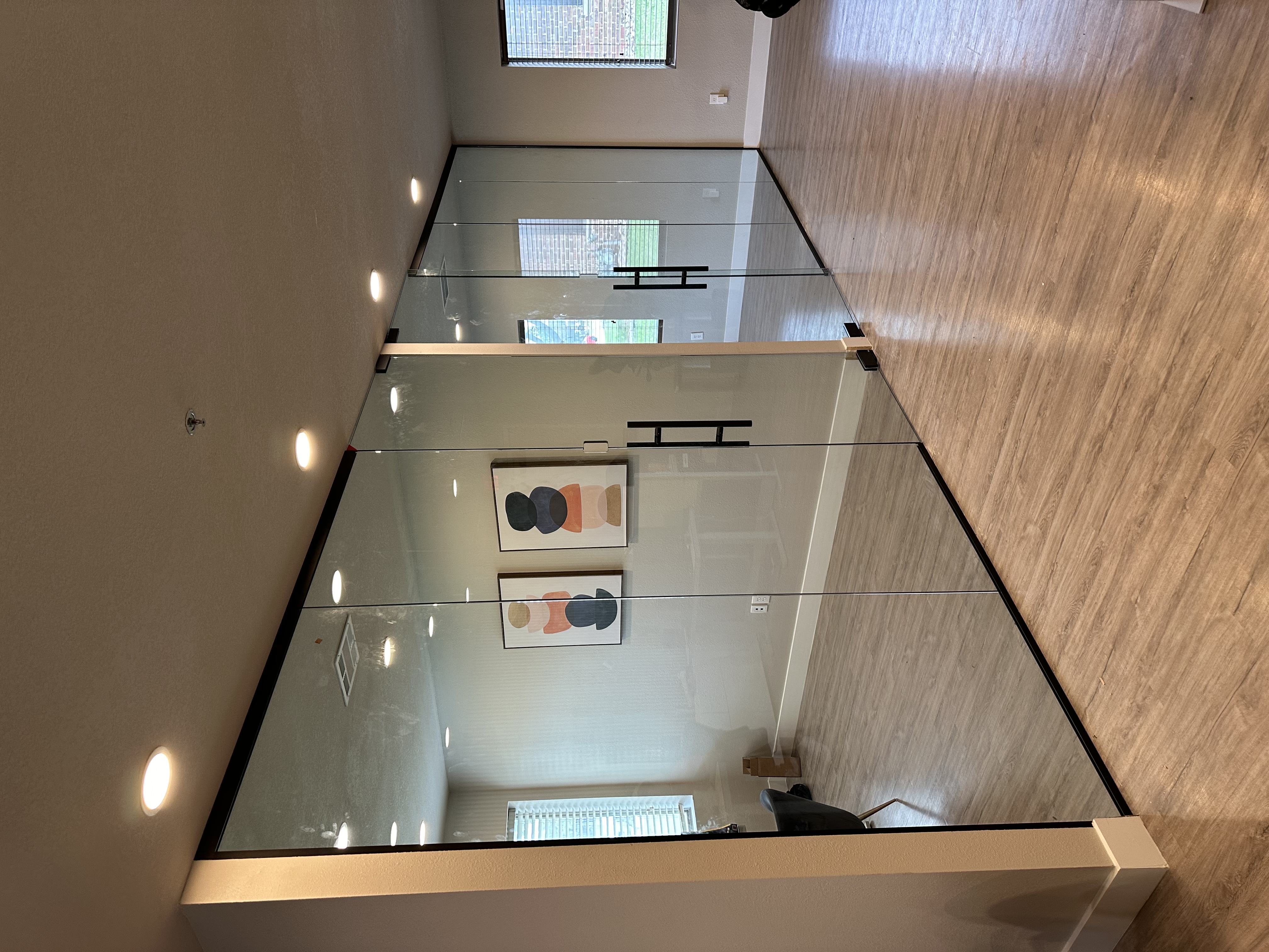 glass wall and door in office space